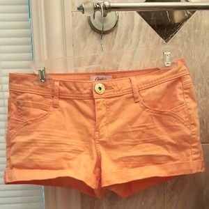 coral peach salmon colored denim shorts